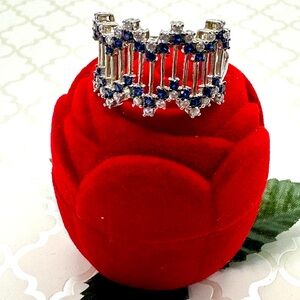 Splendid Sapphire & CZ Silver Ring atop its Red Rose Case